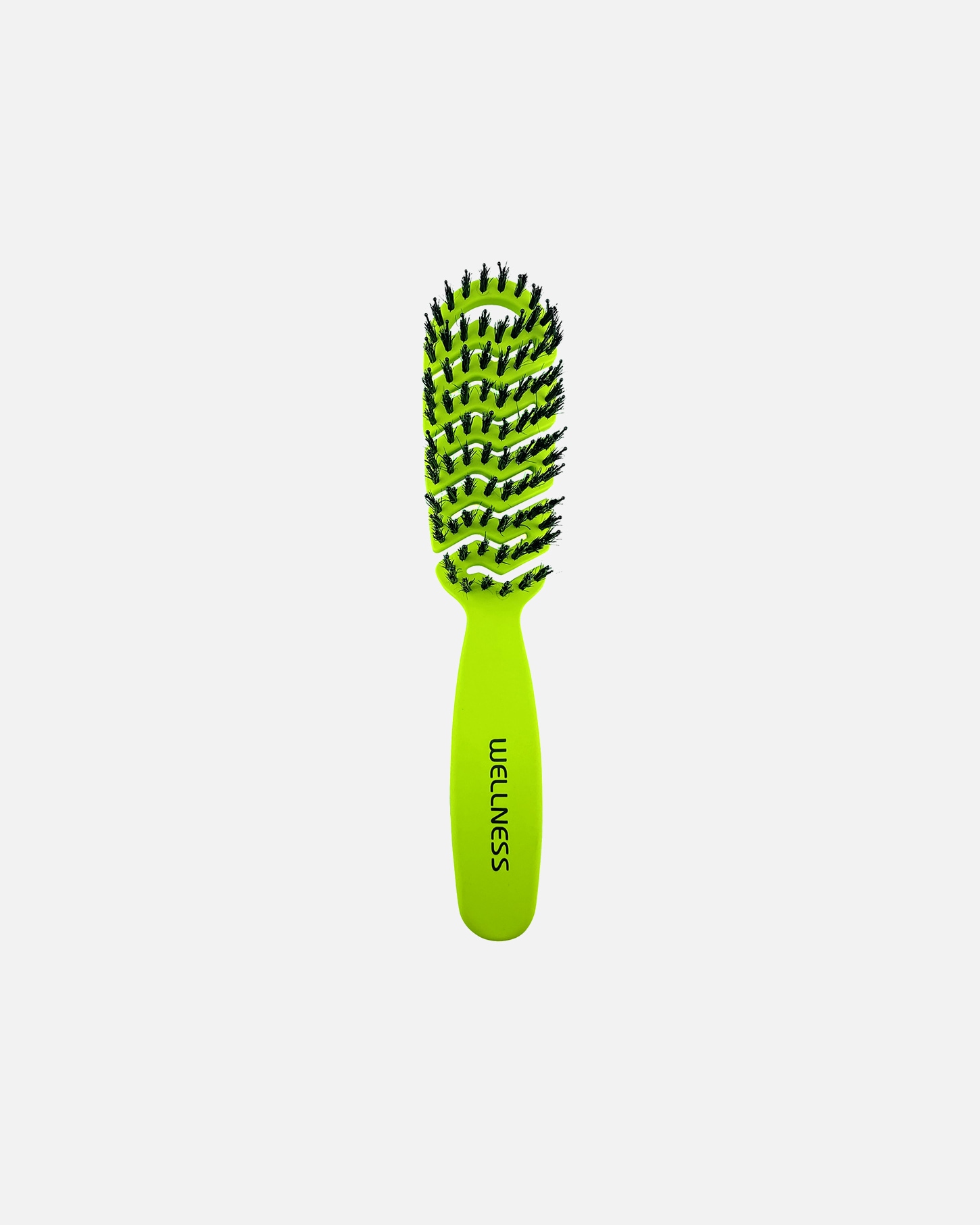 Zielona mini szczotka w prezencie przy zakupie kosmetyków Wellness za min. 399 zł.