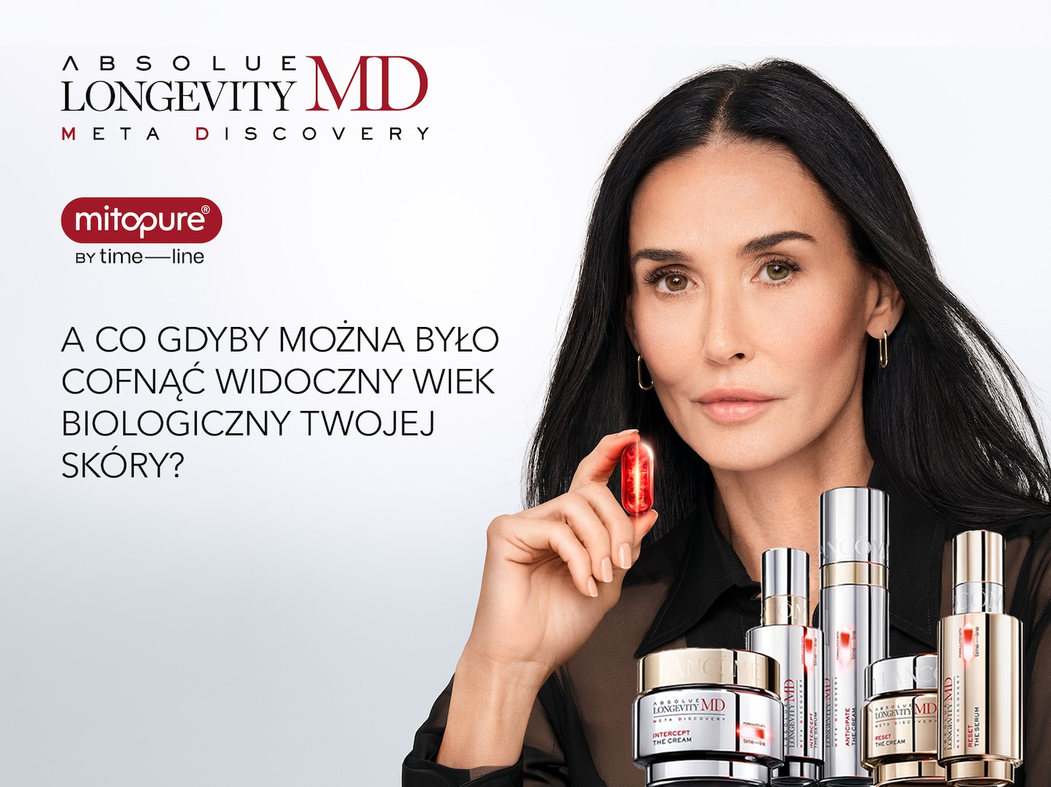 Demi Moore prezentuje serię produktów Absolue Longevity MD Meta Discovery, w tym kremy i serum w srebrno-złotych opakowaniach, obiecujące cofnięcie widocznego i biologicznego wieku skóry.