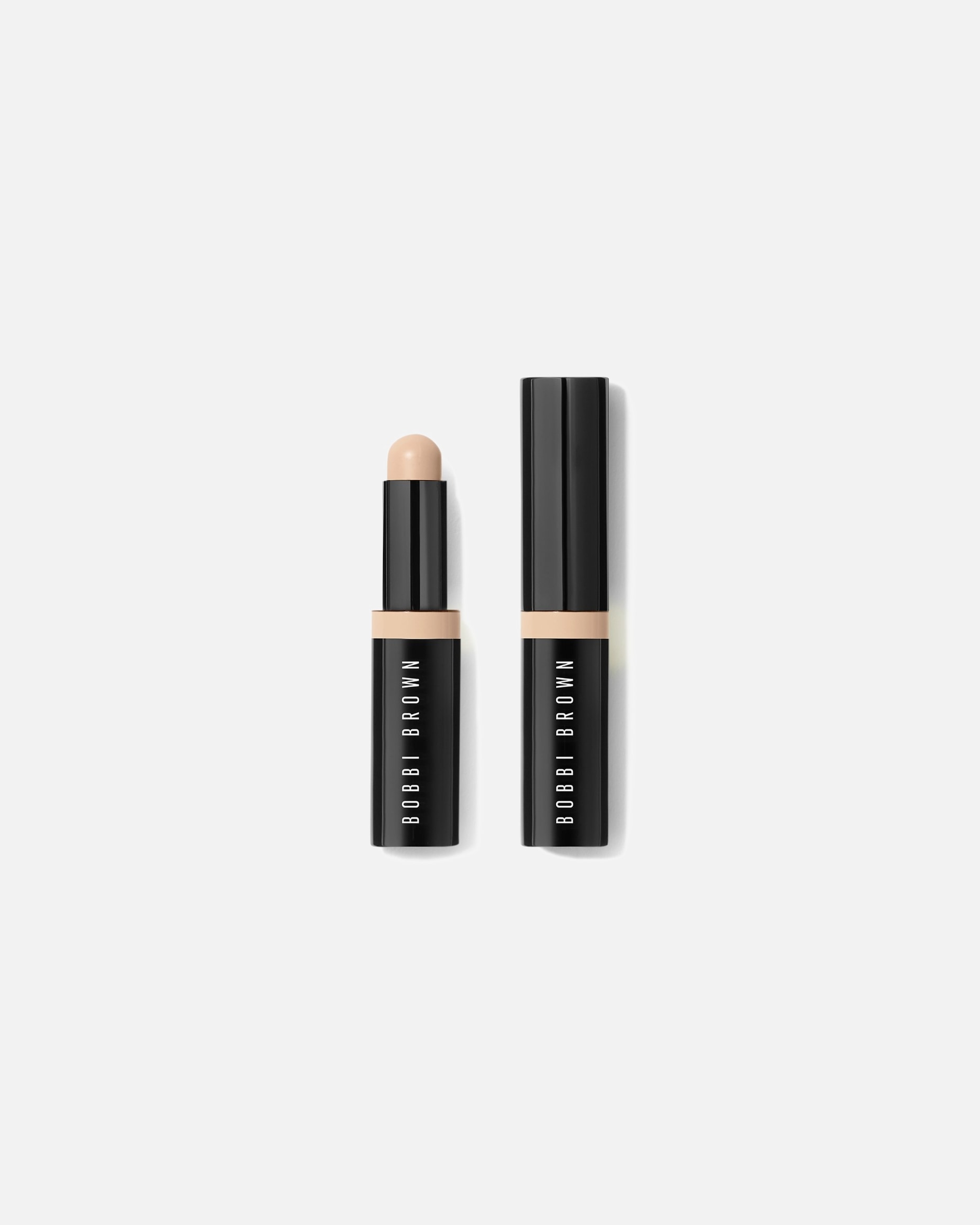 Korektor w sztyfcie dla Unisex Bobbi Brown Skin Corrector Stick 03 - WARM IVORY